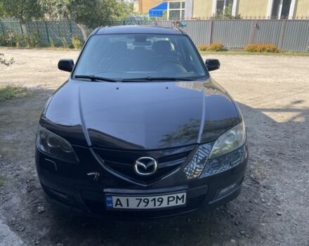 Черный Мазда 3, объемом двигателя 2 л и пробегом 246 тыс. км за 5800 $, фото 1 на Automoto.ua