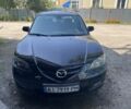Черный Мазда 3, объемом двигателя 2 л и пробегом 246 тыс. км за 5800 $, фото 1 на Automoto.ua
