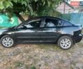 Черный Мазда 3, объемом двигателя 2 л и пробегом 247 тыс. км за 5800 $, фото 4 на Automoto.ua