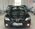 Чорний Мазда 3, об'ємом двигуна 2 л та пробігом 199 тис. км за 7299 $, фото 1 на Automoto.ua