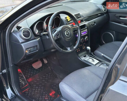 Чорний Мазда 3, об'ємом двигуна 1.6 л та пробігом 183 тис. км за 6500 $, фото 35 на Automoto.ua