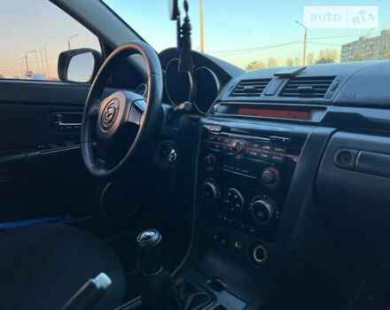 Чорний Мазда 3, об'ємом двигуна 1.6 л та пробігом 183 тис. км за 5600 $, фото 23 на Automoto.ua