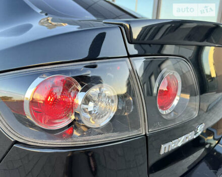 Чорний Мазда 3, об'ємом двигуна 1.6 л та пробігом 183 тис. км за 5600 $, фото 17 на Automoto.ua