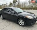 Черный Мазда 3, объемом двигателя 1.6 л и пробегом 165 тыс. км за 7650 $, фото 1 на Automoto.ua