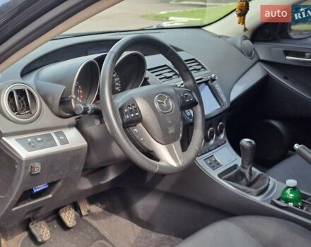 Черный Мазда 3, объемом двигателя 2 л и пробегом 258 тыс. км за 7100 $, фото 11 на Automoto.ua