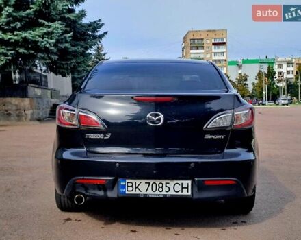 Черный Мазда 3, объемом двигателя 2 л и пробегом 258 тыс. км за 7100 $, фото 1 на Automoto.ua