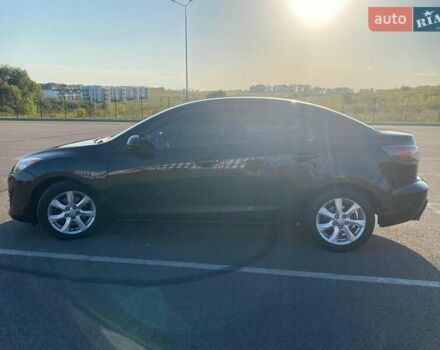 Черный Мазда 3, объемом двигателя 2 л и пробегом 261 тыс. км за 6900 $, фото 4 на Automoto.ua