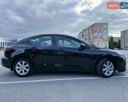 Черный Мазда 3, объемом двигателя 2 л и пробегом 187 тыс. км за 7200 $, фото 6 на Automoto.ua