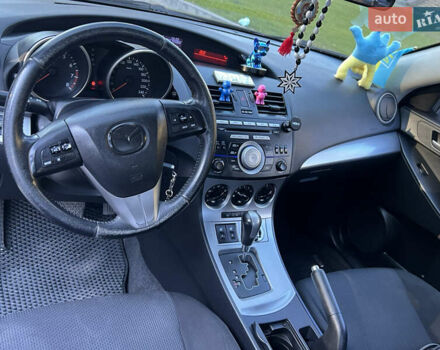Чорний Мазда 3, об'ємом двигуна 1.6 л та пробігом 160 тис. км за 7600 $, фото 6 на Automoto.ua