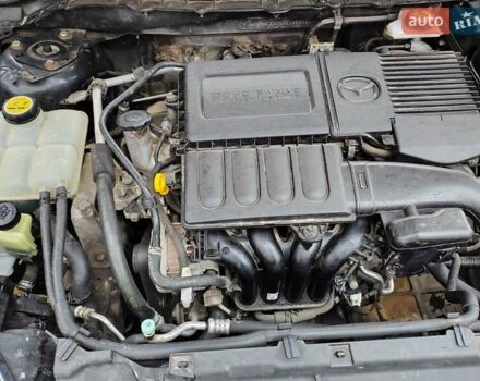 Черный Мазда 3, объемом двигателя 1.6 л и пробегом 213 тыс. км за 7500 $, фото 17 на Automoto.ua