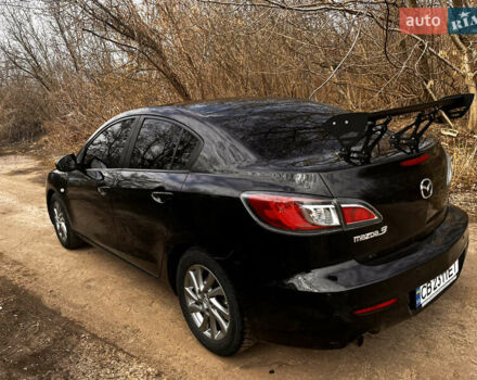 Чорний Мазда 3, об'ємом двигуна 1.6 л та пробігом 245 тис. км за 6800 $, фото 5 на Automoto.ua