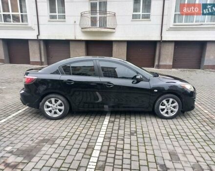 Черный Мазда 3, объемом двигателя 1.6 л и пробегом 257 тыс. км за 7850 $, фото 10 на Automoto.ua