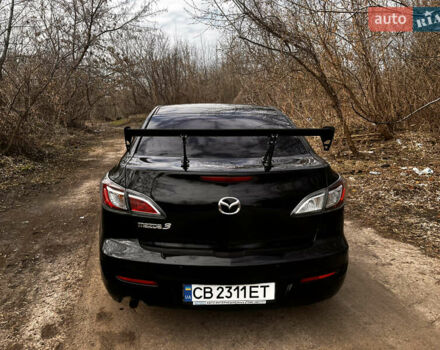 Чорний Мазда 3, об'ємом двигуна 1.6 л та пробігом 245 тис. км за 6800 $, фото 6 на Automoto.ua