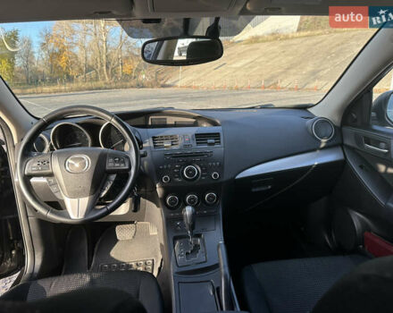 Чорний Мазда 3, об'ємом двигуна 1.6 л та пробігом 188 тис. км за 7400 $, фото 14 на Automoto.ua