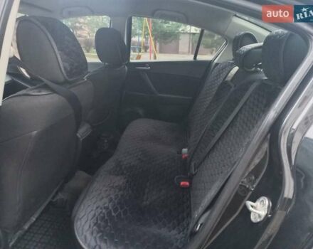 Черный Мазда 3, объемом двигателя 1.6 л и пробегом 257 тыс. км за 7850 $, фото 35 на Automoto.ua