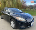 Чорний Мазда 3, об'ємом двигуна 1.6 л та пробігом 256 тис. км за 6999 $, фото 1 на Automoto.ua