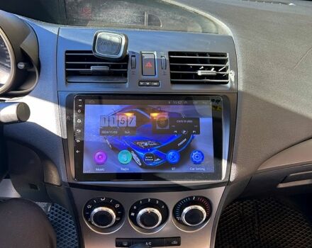 Чорний Мазда 3, об'ємом двигуна 2 л та пробігом 260 тис. км за 6800 $, фото 12 на Automoto.ua
