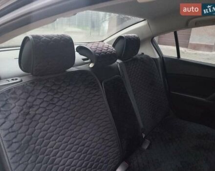 Черный Мазда 3, объемом двигателя 1.6 л и пробегом 257 тыс. км за 7850 $, фото 32 на Automoto.ua