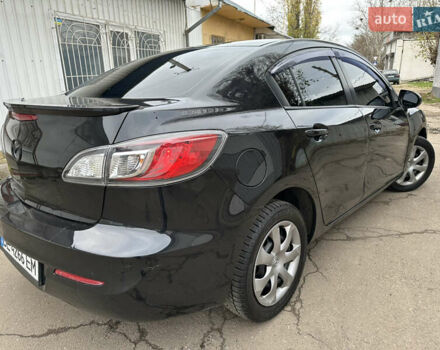 Черный Мазда 3, объемом двигателя 2 л и пробегом 280 тыс. км за 6700 $, фото 10 на Automoto.ua