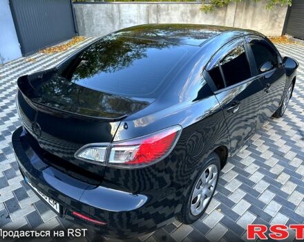 Черный Мазда 3, объемом двигателя 2 л и пробегом 280 тыс. км за 6950 $, фото 5 на Automoto.ua