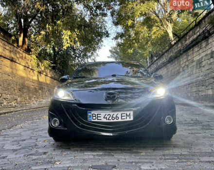 Черный Мазда 3, объемом двигателя 2 л и пробегом 280 тыс. км за 7000 $, фото 4 на Automoto.ua