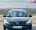 Черный Мазда 3, объемом двигателя 2 л и пробегом 172 тыс. км за 7350 $, фото 1 на Automoto.ua