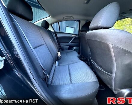 Черный Мазда 3, объемом двигателя 2 л и пробегом 280 тыс. км за 6950 $, фото 12 на Automoto.ua