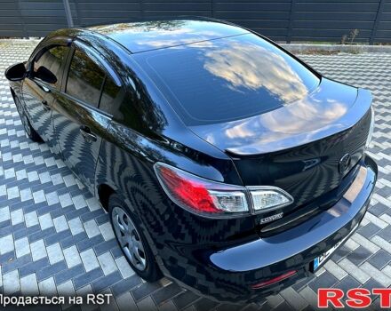 Черный Мазда 3, объемом двигателя 2 л и пробегом 280 тыс. км за 6950 $, фото 3 на Automoto.ua