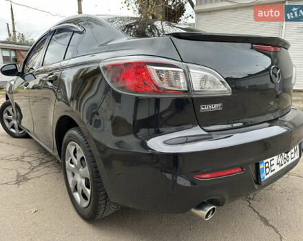 Черный Мазда 3, объемом двигателя 2 л и пробегом 280 тыс. км за 6700 $, фото 5 на Automoto.ua