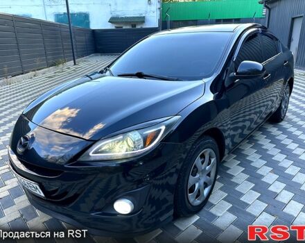Черный Мазда 3, объемом двигателя 2 л и пробегом 280 тыс. км за 6950 $, фото 1 на Automoto.ua