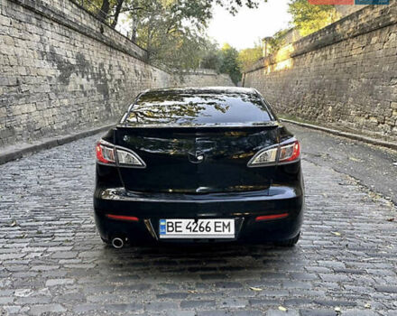 Черный Мазда 3, объемом двигателя 2 л и пробегом 280 тыс. км за 7000 $, фото 6 на Automoto.ua