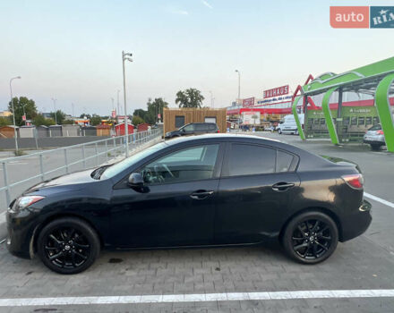 Черный Мазда 3, объемом двигателя 2 л и пробегом 235 тыс. км за 7400 $, фото 6 на Automoto.ua