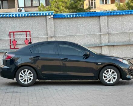 Чорний Мазда 3, об'ємом двигуна 2 л та пробігом 240 тис. км за 6990 $, фото 3 на Automoto.ua
