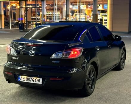 Чорний Мазда 3, об'ємом двигуна 2 л та пробігом 140 тис. км за 7700 $, фото 4 на Automoto.ua