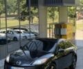 Чорний Мазда 3, об'ємом двигуна 2 л та пробігом 230 тис. км за 7499 $, фото 1 на Automoto.ua