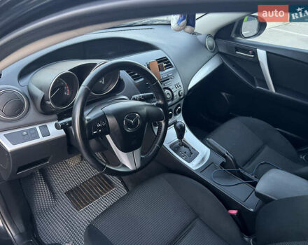 Черный Мазда 3, объемом двигателя 2 л и пробегом 235 тыс. км за 7400 $, фото 5 на Automoto.ua