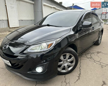 Черный Мазда 3, объемом двигателя 2 л и пробегом 280 тыс. км за 6700 $, фото 1 на Automoto.ua