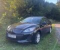 Черный Мазда 3, объемом двигателя 2 л и пробегом 230 тыс. км за 8500 $, фото 1 на Automoto.ua
