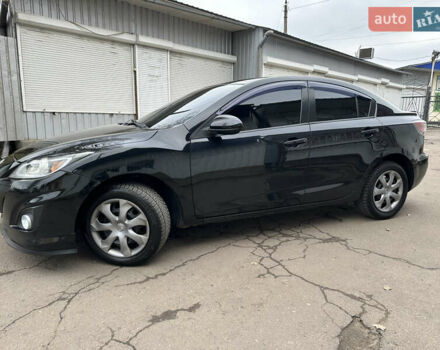 Черный Мазда 3, объемом двигателя 2 л и пробегом 280 тыс. км за 6700 $, фото 3 на Automoto.ua