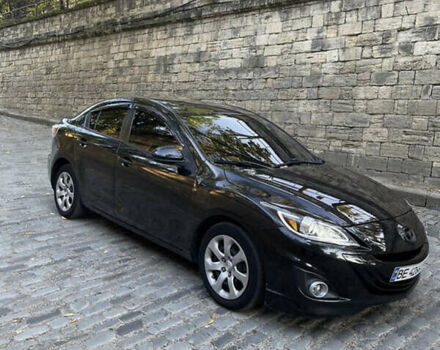 Черный Мазда 3, объемом двигателя 2 л и пробегом 280 тыс. км за 7000 $, фото 1 на Automoto.ua