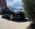 Черный Мазда 3, объемом двигателя 2 л и пробегом 240 тыс. км за 8990 $, фото 1 на Automoto.ua