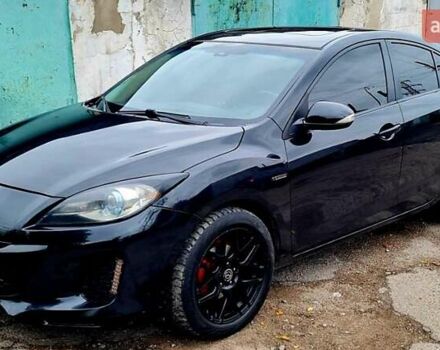 Черный Мазда 3, объемом двигателя 2 л и пробегом 189 тыс. км за 7700 $, фото 2 на Automoto.ua