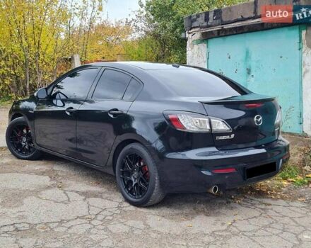Черный Мазда 3, объемом двигателя 2 л и пробегом 189 тыс. км за 7700 $, фото 3 на Automoto.ua
