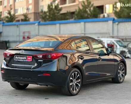 Чорний Мазда 3, об'ємом двигуна 2 л та пробігом 94 тис. км за 10940 $, фото 4 на Automoto.ua