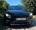 Чорний Мазда 3, об'ємом двигуна 2 л та пробігом 154 тис. км за 10800 $, фото 4 на Automoto.ua