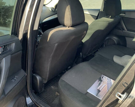 Черный Мазда 3, объемом двигателя 2 л и пробегом 196 тыс. км за 7200 $, фото 11 на Automoto.ua