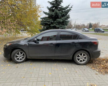 Черный Мазда 3, объемом двигателя 2 л и пробегом 196 тыс. км за 7200 $, фото 1 на Automoto.ua