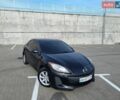 Черный Мазда 3, объемом двигателя 2 л и пробегом 125 тыс. км за 6800 $, фото 1 на Automoto.ua