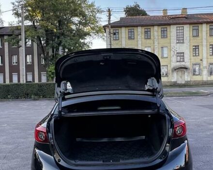 Чорний Мазда 3, об'ємом двигуна 2 л та пробігом 147 тис. км за 10299 $, фото 16 на Automoto.ua
