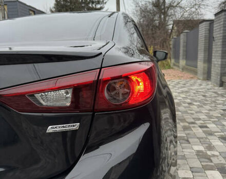 Чорний Мазда 3, об'ємом двигуна 1.5 л та пробігом 143 тис. км за 10900 $, фото 27 на Automoto.ua